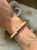 Delikatna bransoletka handmade w pastelowych odcieniach z kwiatkiem